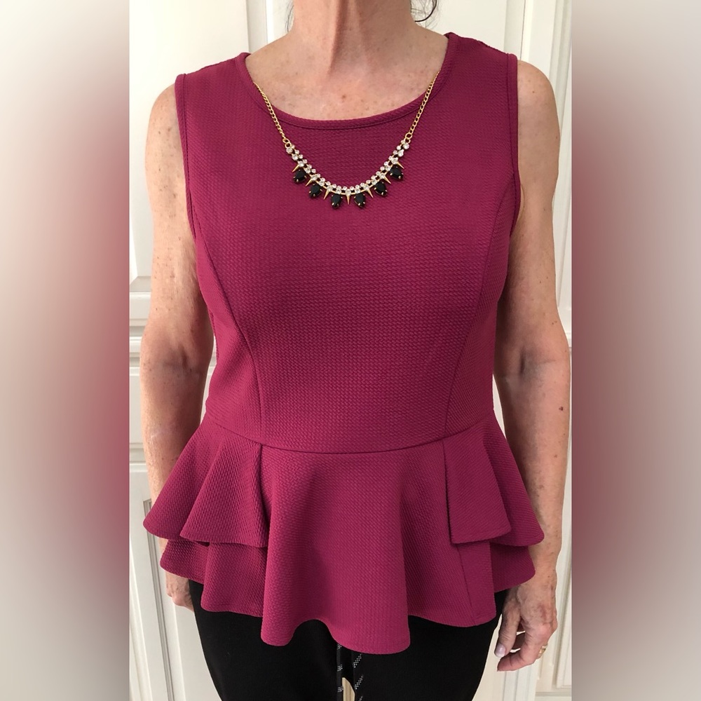 Fuchsia Sleeveless Peplum Top